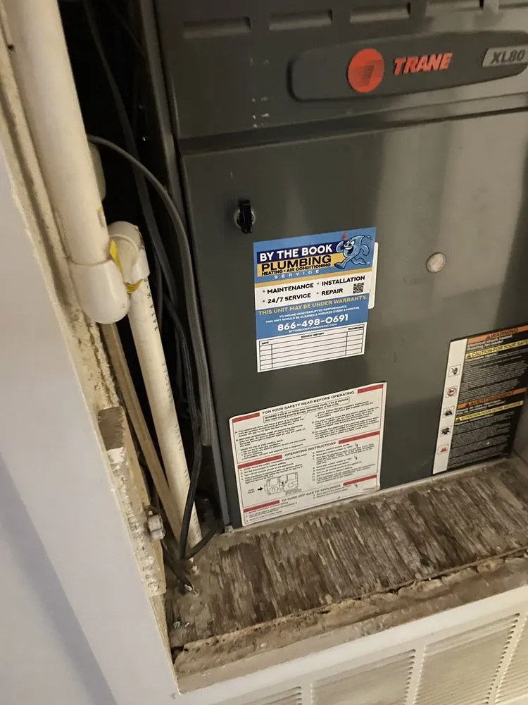 Slide of By The Book Plumbing Heating Air Conditioning