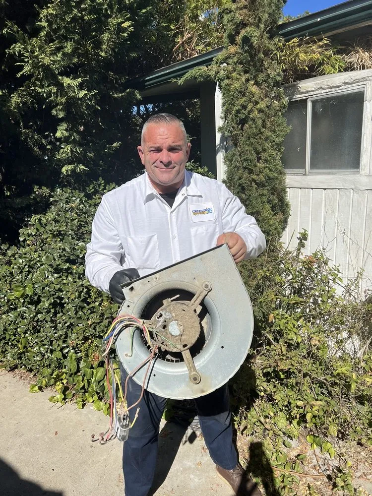 Slide of By The Book Plumbing Heating Air Conditioning