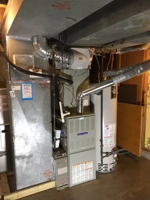 Carl's custom air and plumbing service Logo