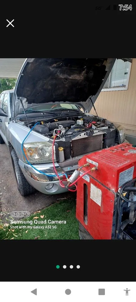 Slide of Castro Body Shop and AC Recharge