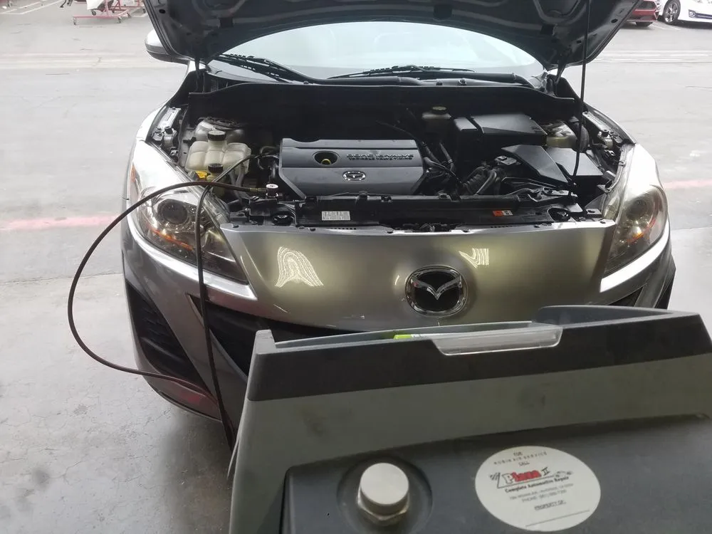 Slide of Castro Body Shop and AC Recharge