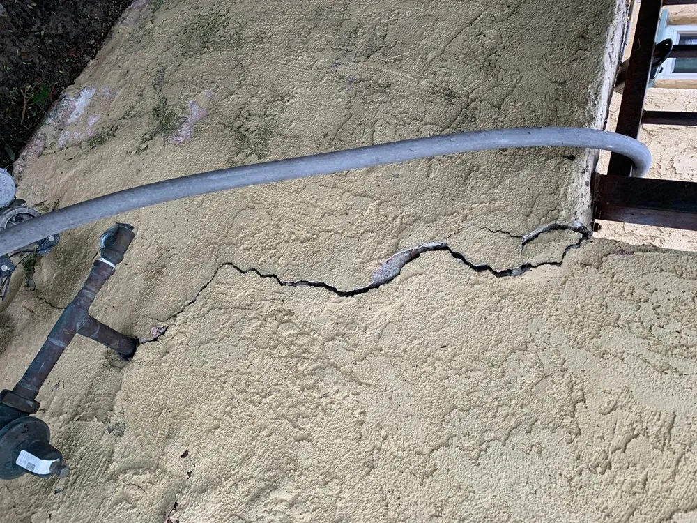 Slide of CAT Exteriors