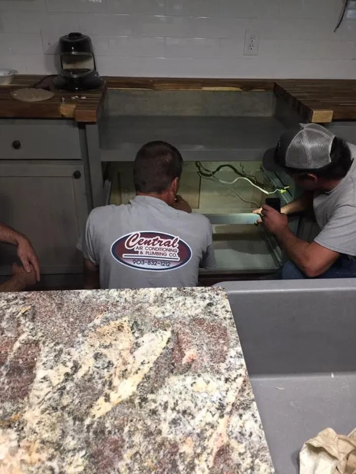 Slide of Central Air Conditioning & Plumbing