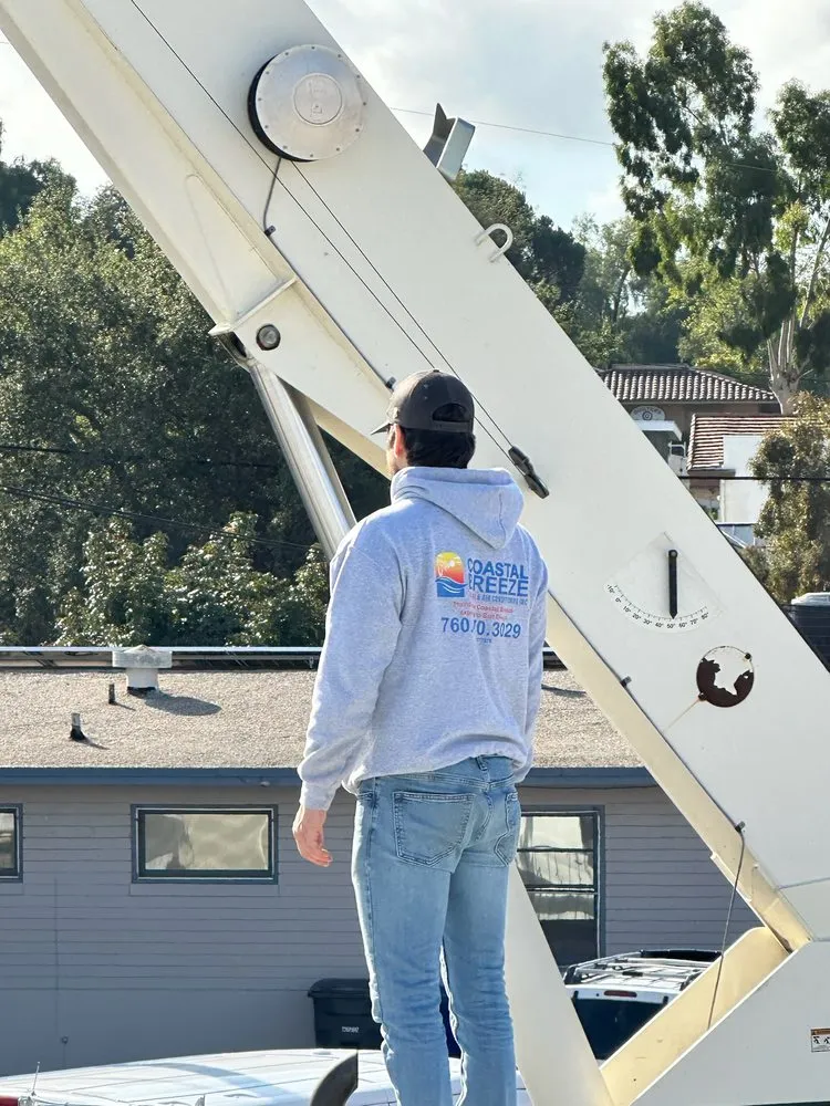 Slide of Coastal Breeze Heating & Air Condtioning