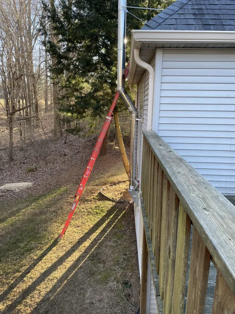 Slide of Coffman's Chimney Sweeps & Wood Heating Specialists