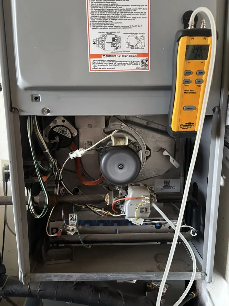 Slide of Cross Heat & Air