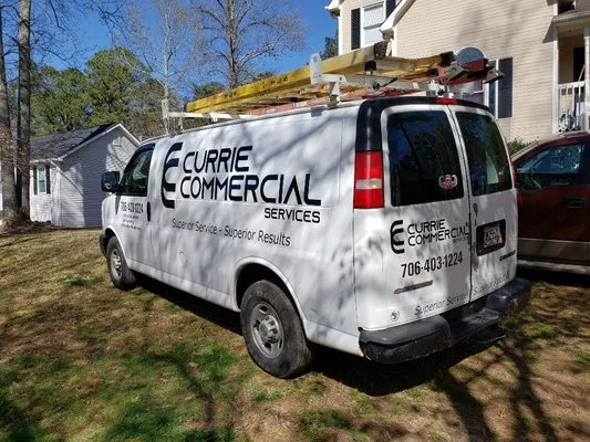 Currie commercial services Logo