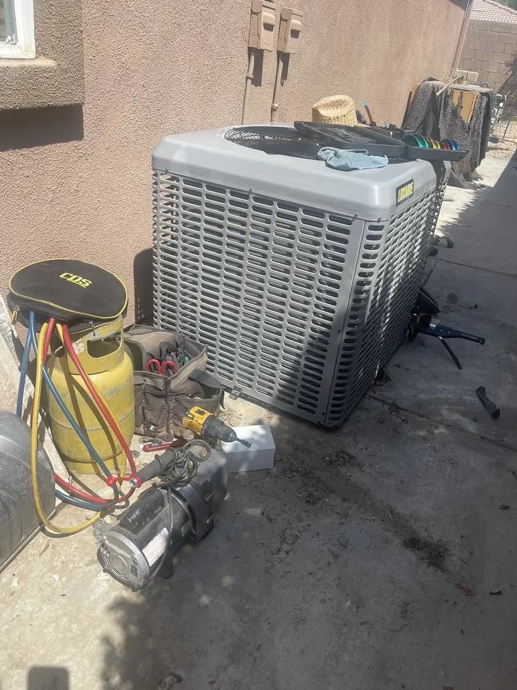 Slide of Day & Night Heating & Air Conditioning