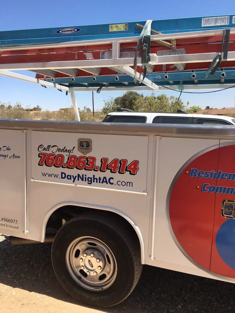 Slide of Day & Night Heating & Air Conditioning