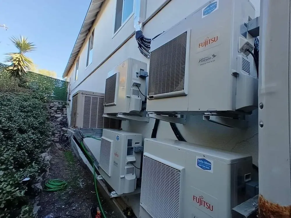 Slide of Della-Mora Heating and Air Conditioning