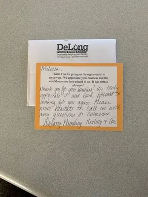 DeLong Plumbing Heating & Air Logo