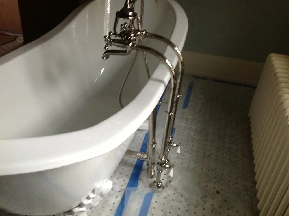 Slide of Deluxe Plumbing & Heating