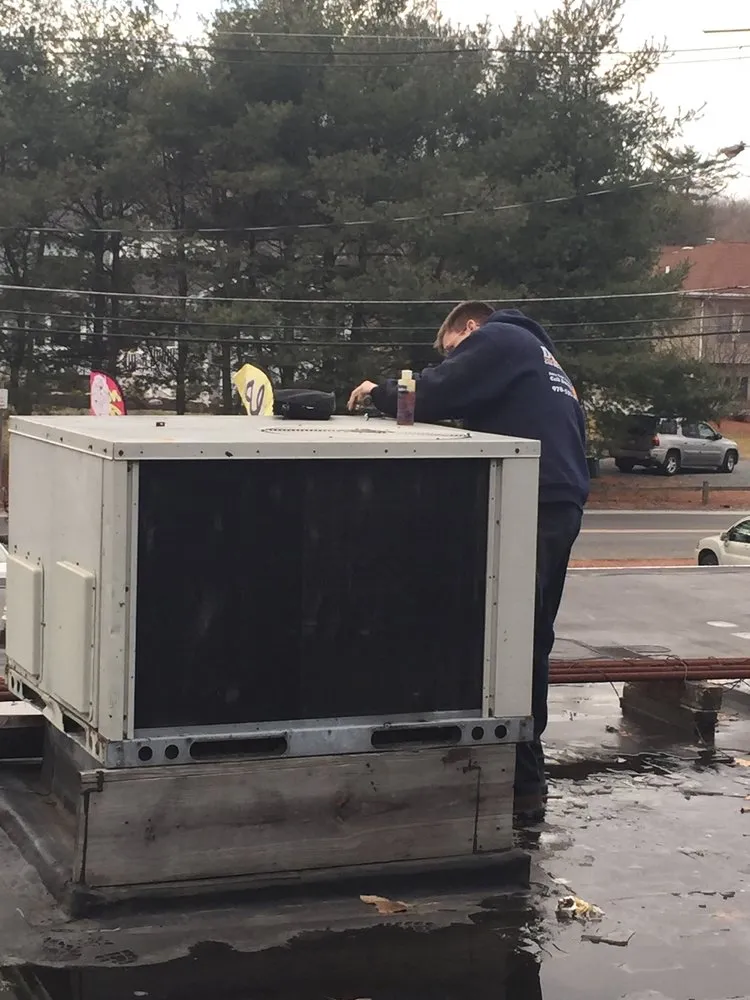 Slide of Denny's Gas Oil & Air Service