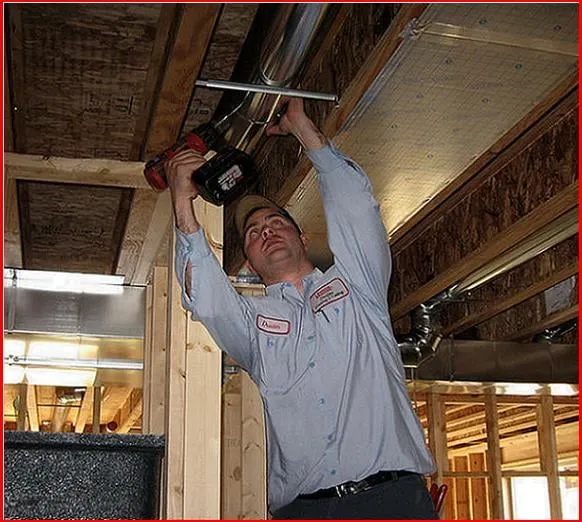 Slide of Dischler Heating-Cooling and Fireplaces