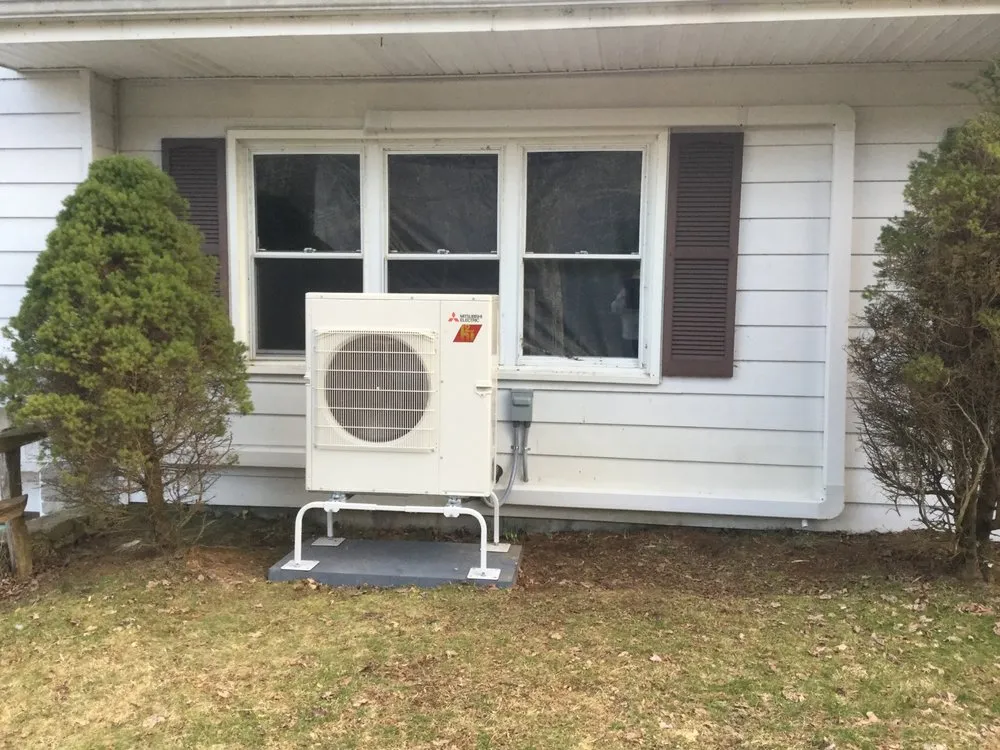 Slide of DJ's Heating Service