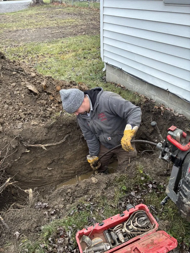 Slide of Doug's Plumbing & Heating