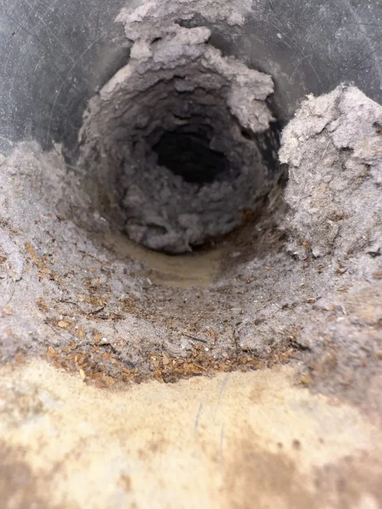 Slide of Dryer Vent Superheroes Louisville