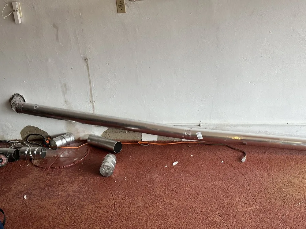 Slide of Dryer Vent Wizard of Weston