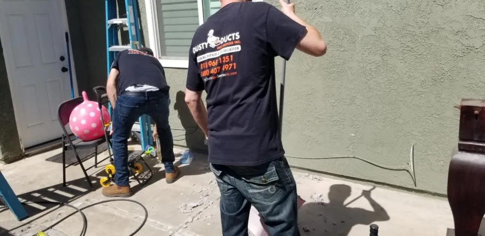 Slide of Dusty Ducts HVAC Services