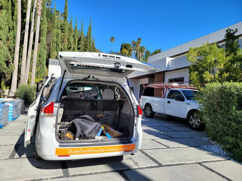 Slide of Dusty Ducts HVAC Services