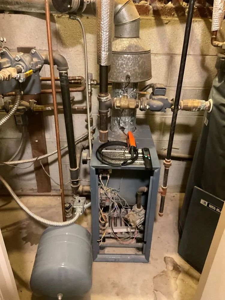 Slide of Dye Plumbing & Heating Service