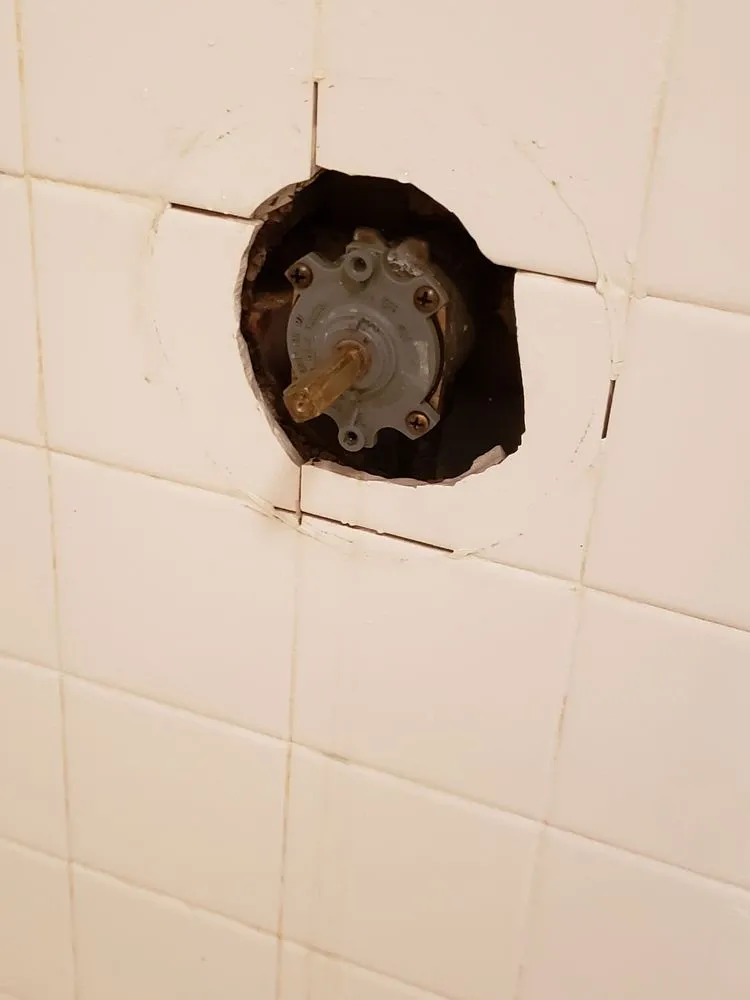 Slide of Dye Plumbing & Heating Service