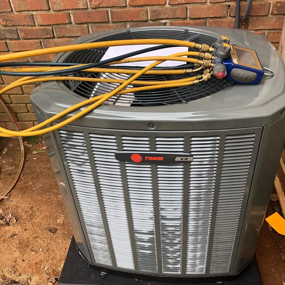 Slide of E. Dennis Heating, Cooling, Plumbing & Electrical