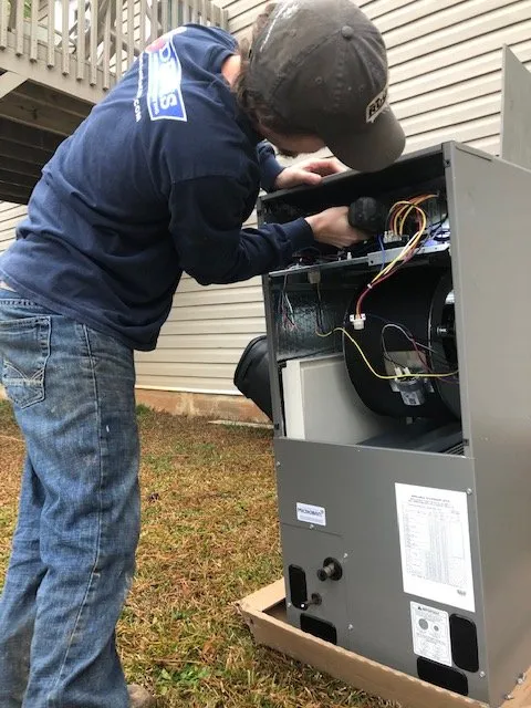 Slide of E. Dennis Heating, Cooling, Plumbing & Electrical