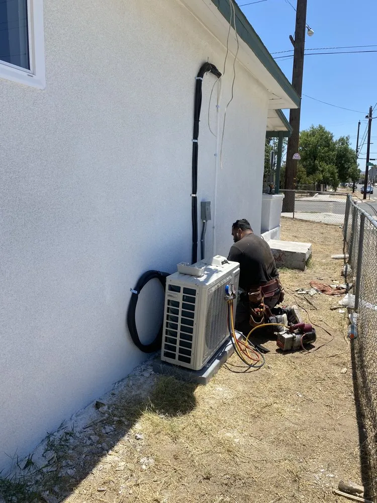 Slide of E. Medina A/C & Heating