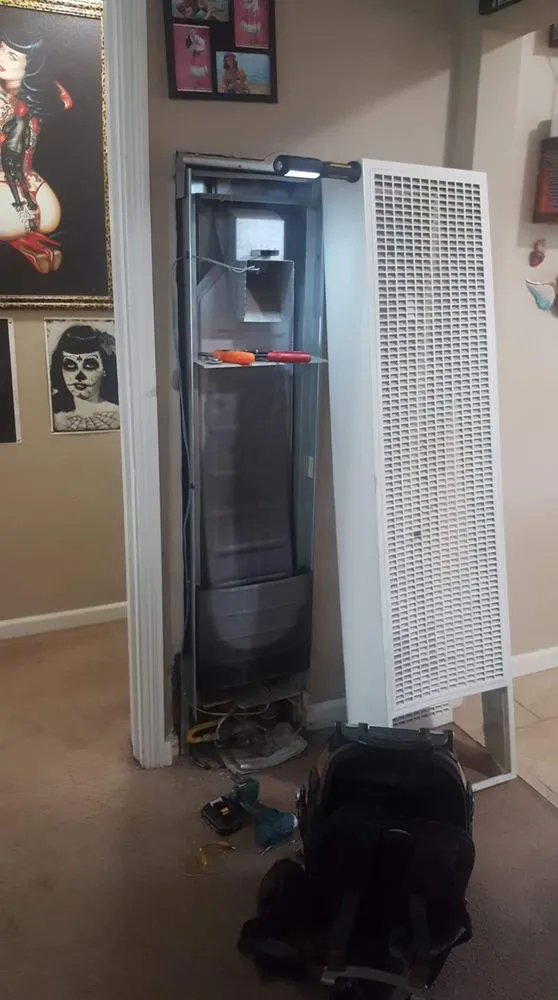 Slide of EJ's Air Conditioning