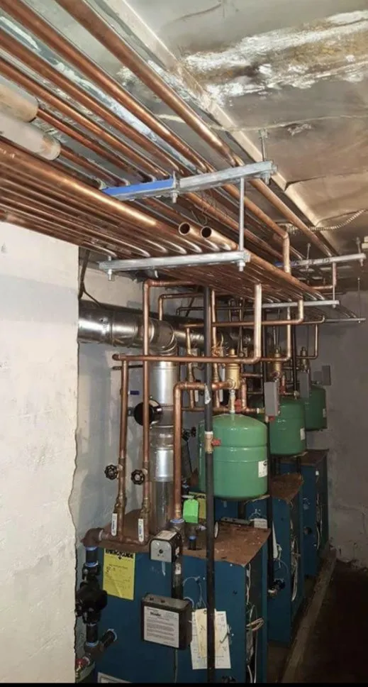 Slide of EKG Plumbing and Heating