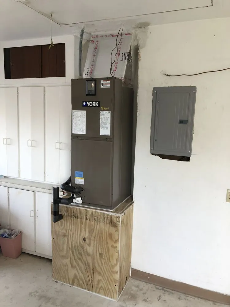 Slide of Elite Air Conditioning & Construction