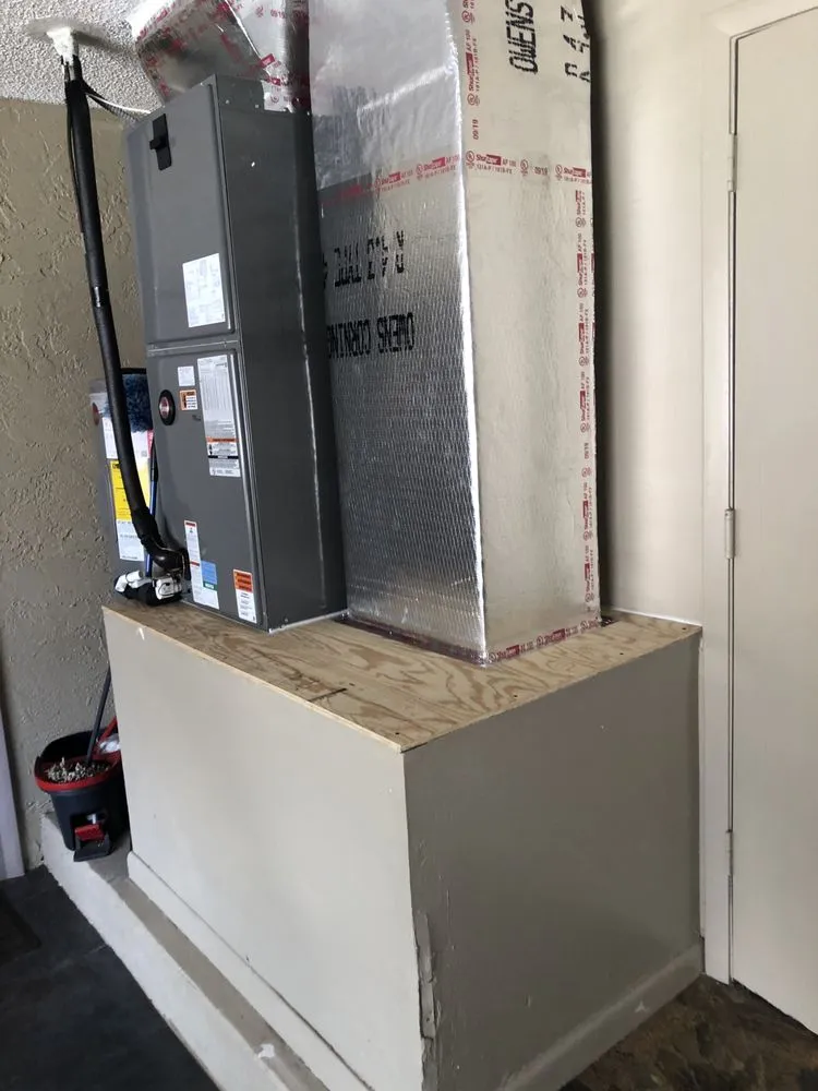 Slide of Elite Air Conditioning & Construction