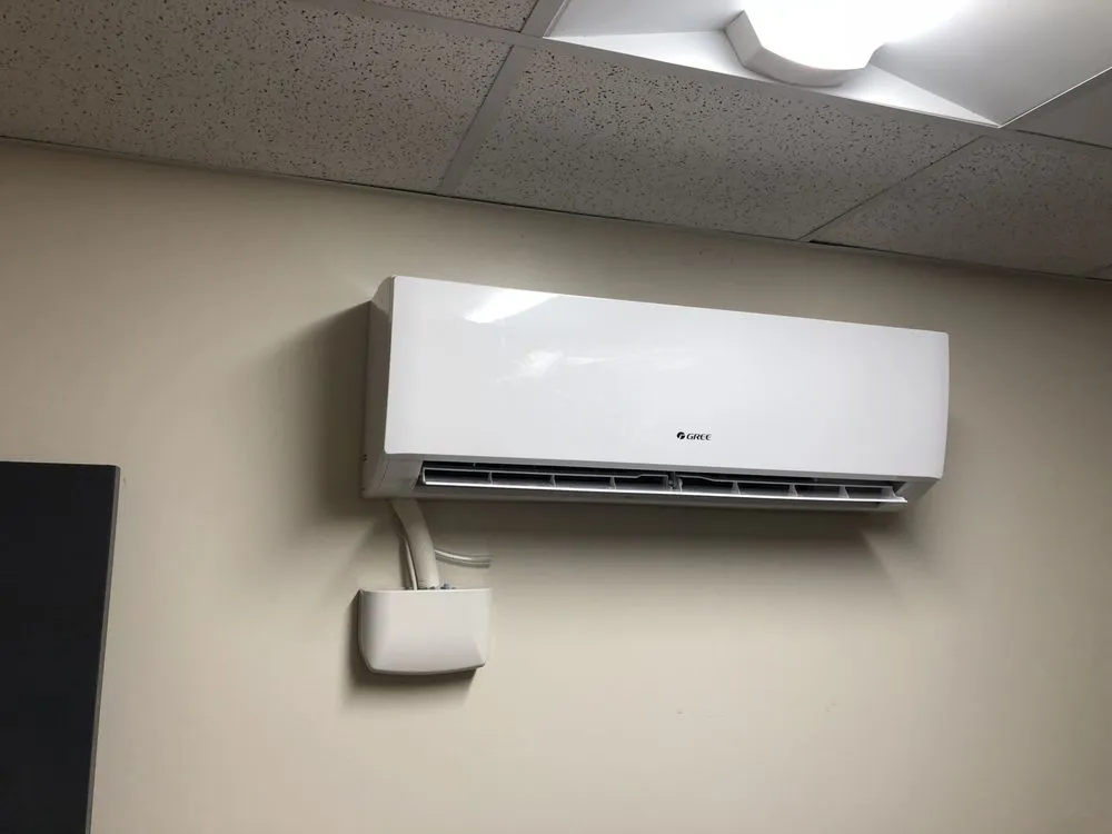 Slide of Elite Air Conditioning & Construction