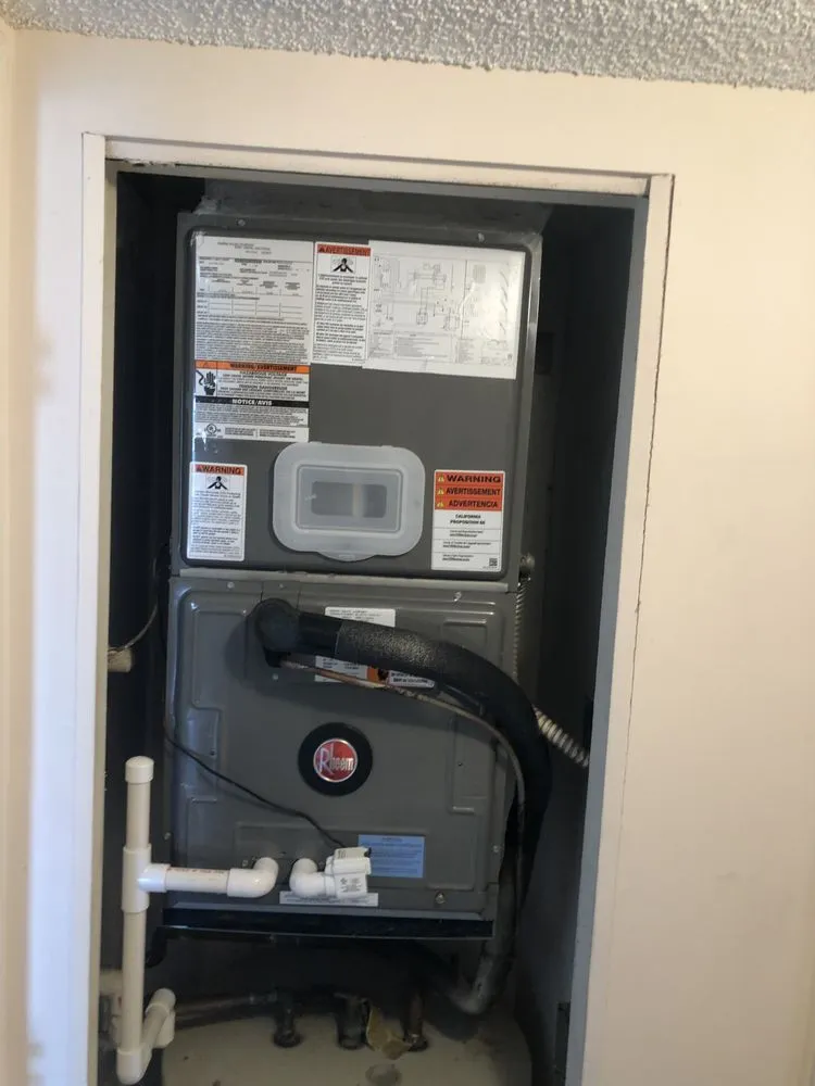 Slide of Elite Air Conditioning & Construction