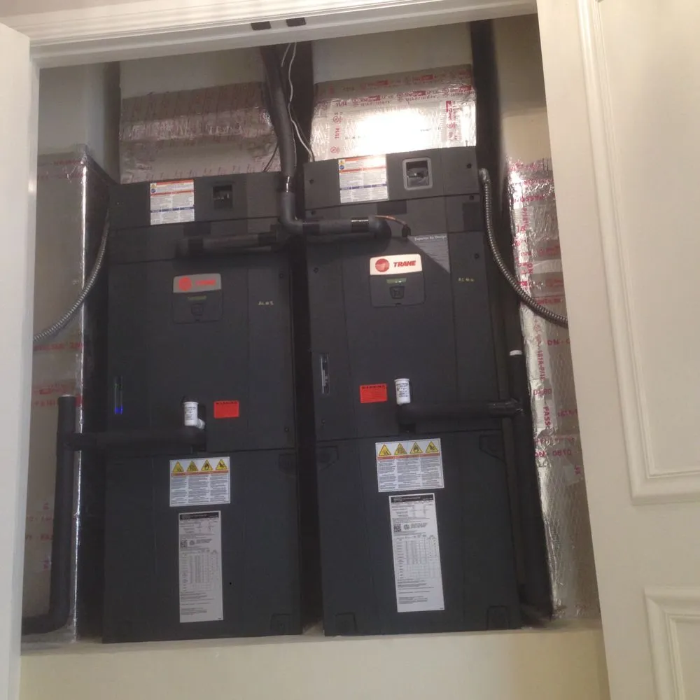 Slide of Elite Air Conditioning & Construction