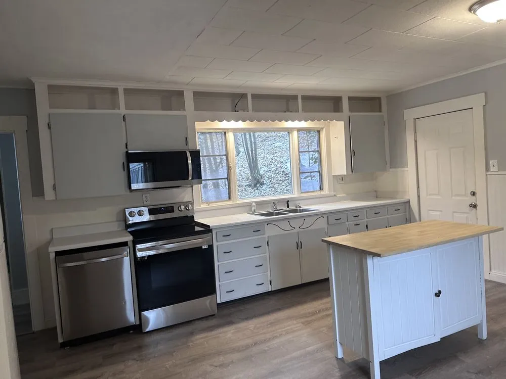 Slide of Emerson family contractors