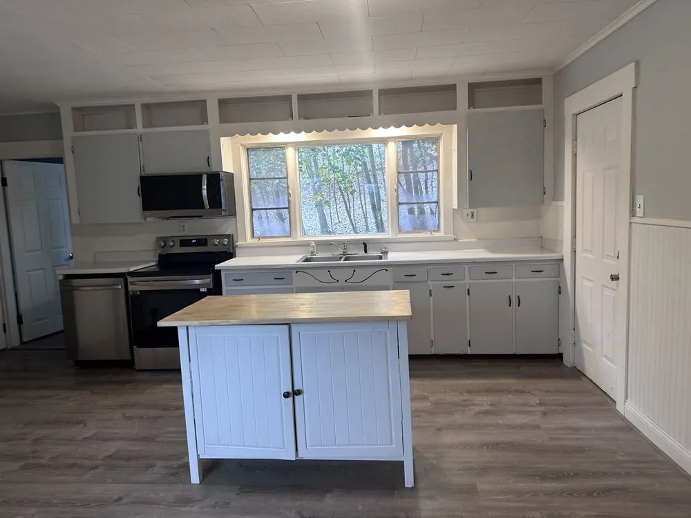 Slide of Emerson family contractors