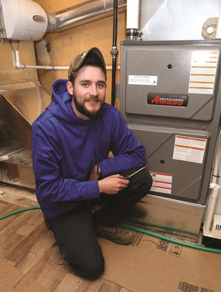 Slide of ER Mann Heating & Cooling