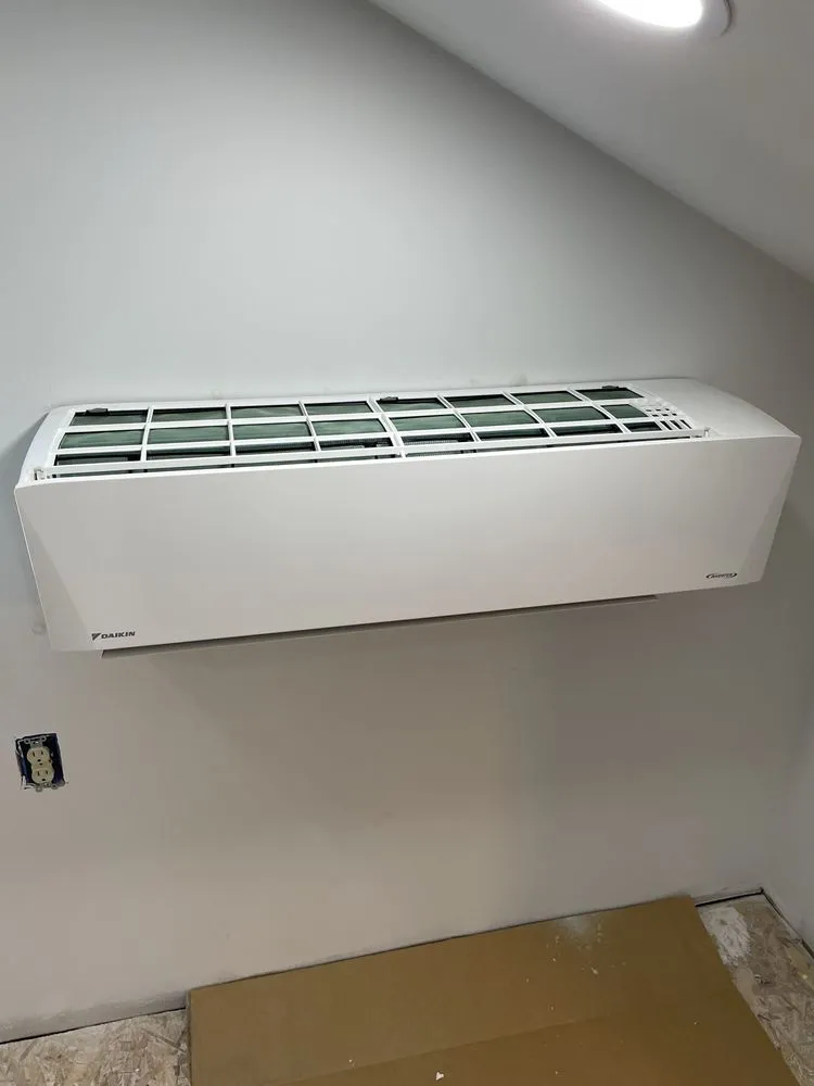 Slide of Eric El Heating And Cooling Services