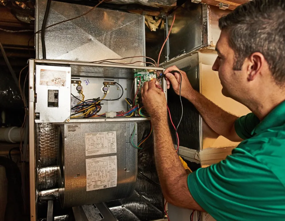 Slide of Ernie Central Heating Repair Service