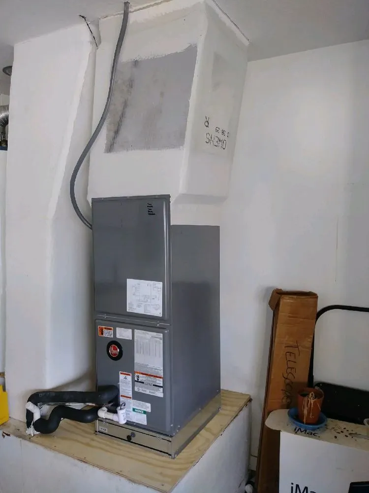 Slide of Eskimo Brothers AC and Heating