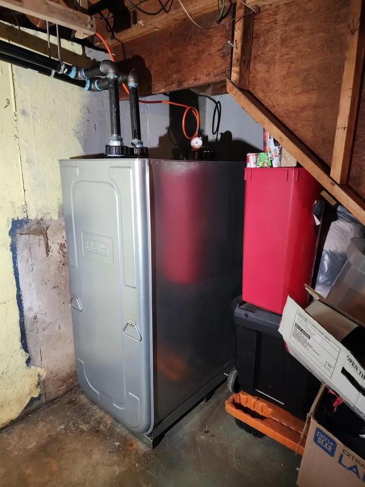 Slide of Etna Tank Removal