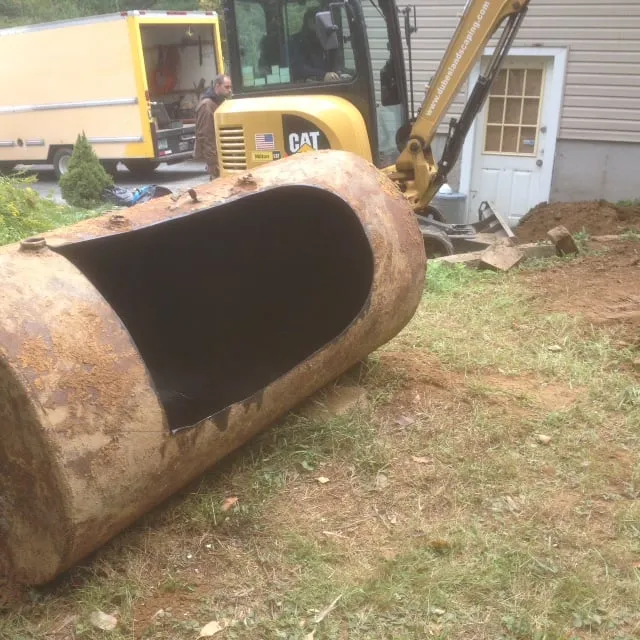 Slide of Etna Tank Removal