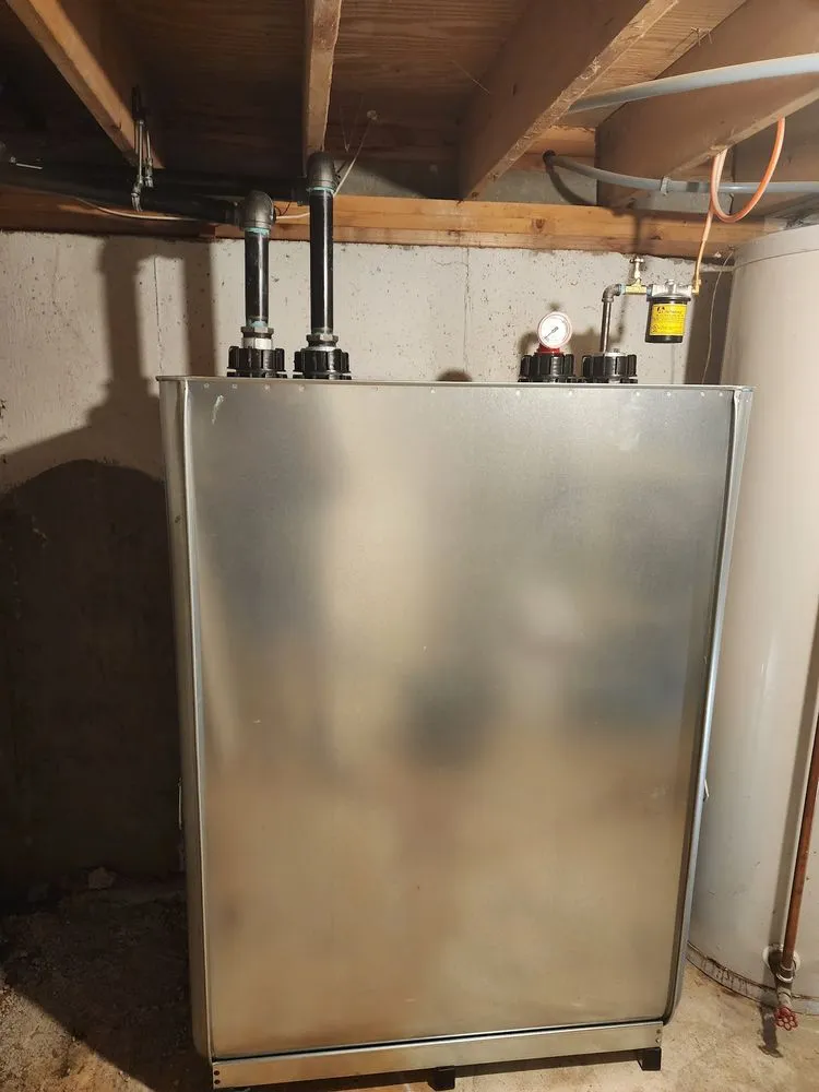 Slide of Etna Tank Removal