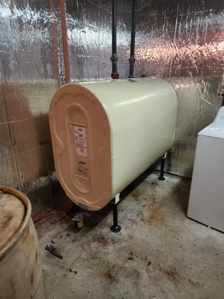 Slide of Etna Tank Removal