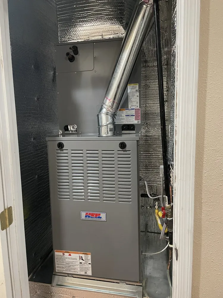 Slide of Etsitty’s Heating And Cooling