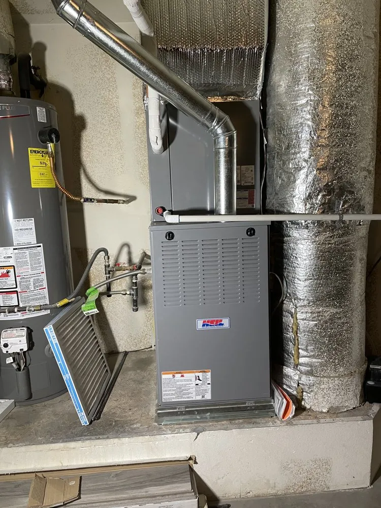 Slide of Etsitty’s Heating And Cooling