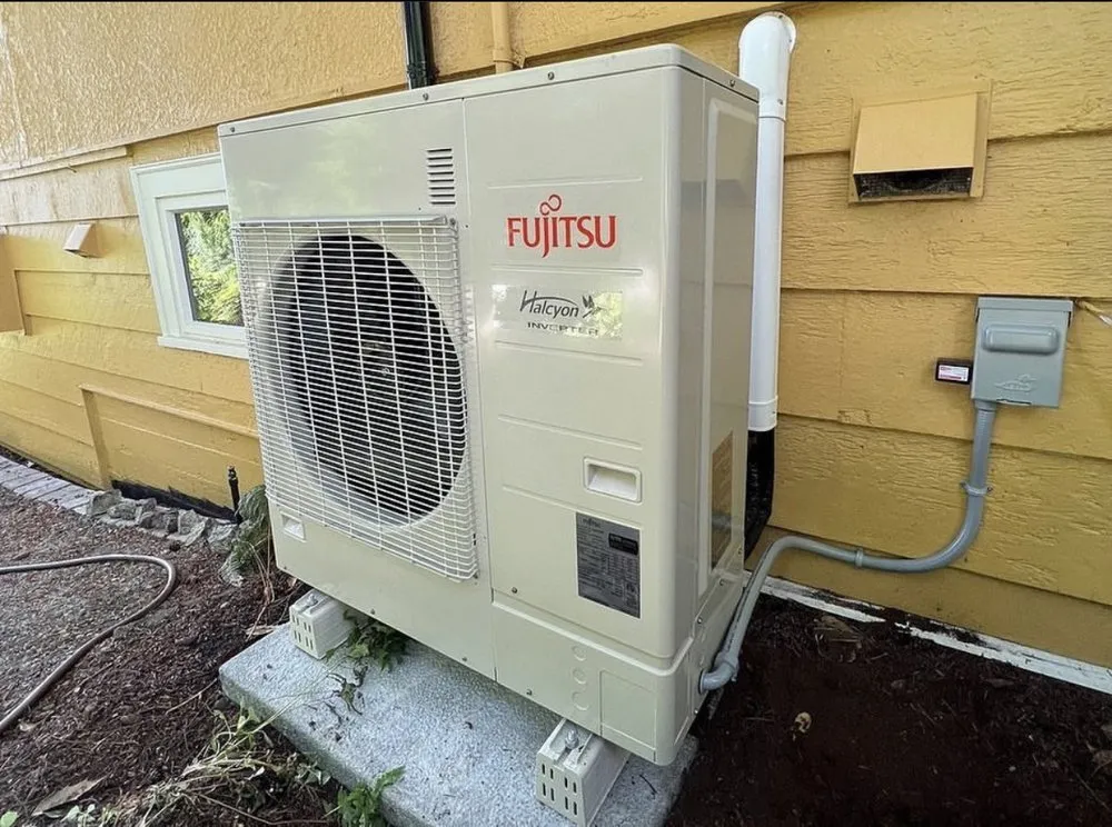 Slide of Etsitty’s Heating And Cooling