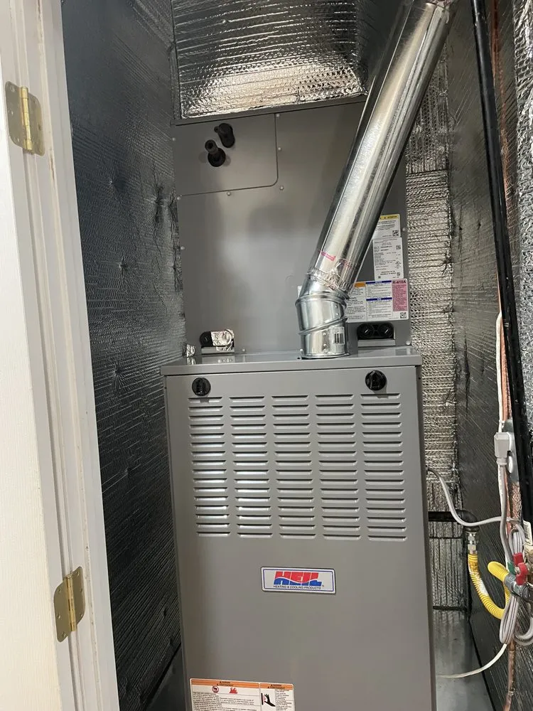 Slide of Etsitty’s Heating And Cooling